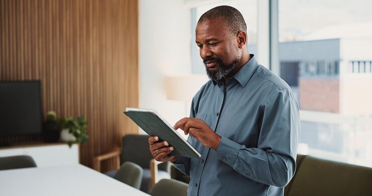 business tablet black man office broker typing with website trading portfolio mature person investor employee with tech finance report email audit results digital app 590464 559277
